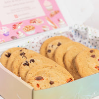 Box of cookies with a colorful background