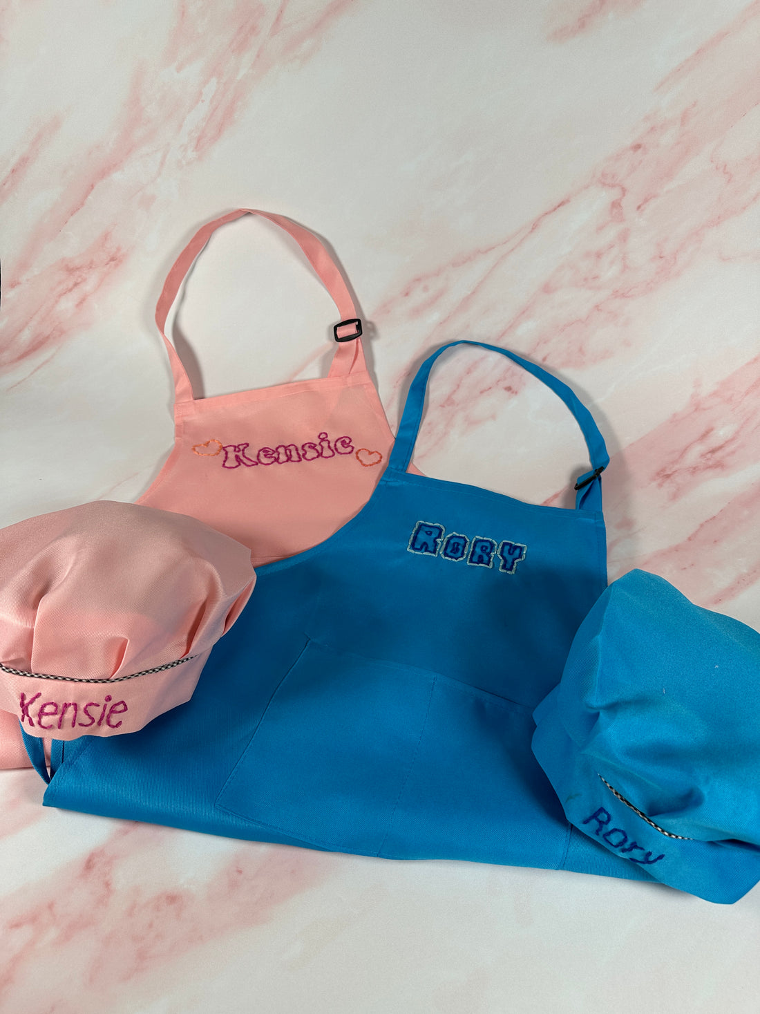 Blue and pink swimsuits with &